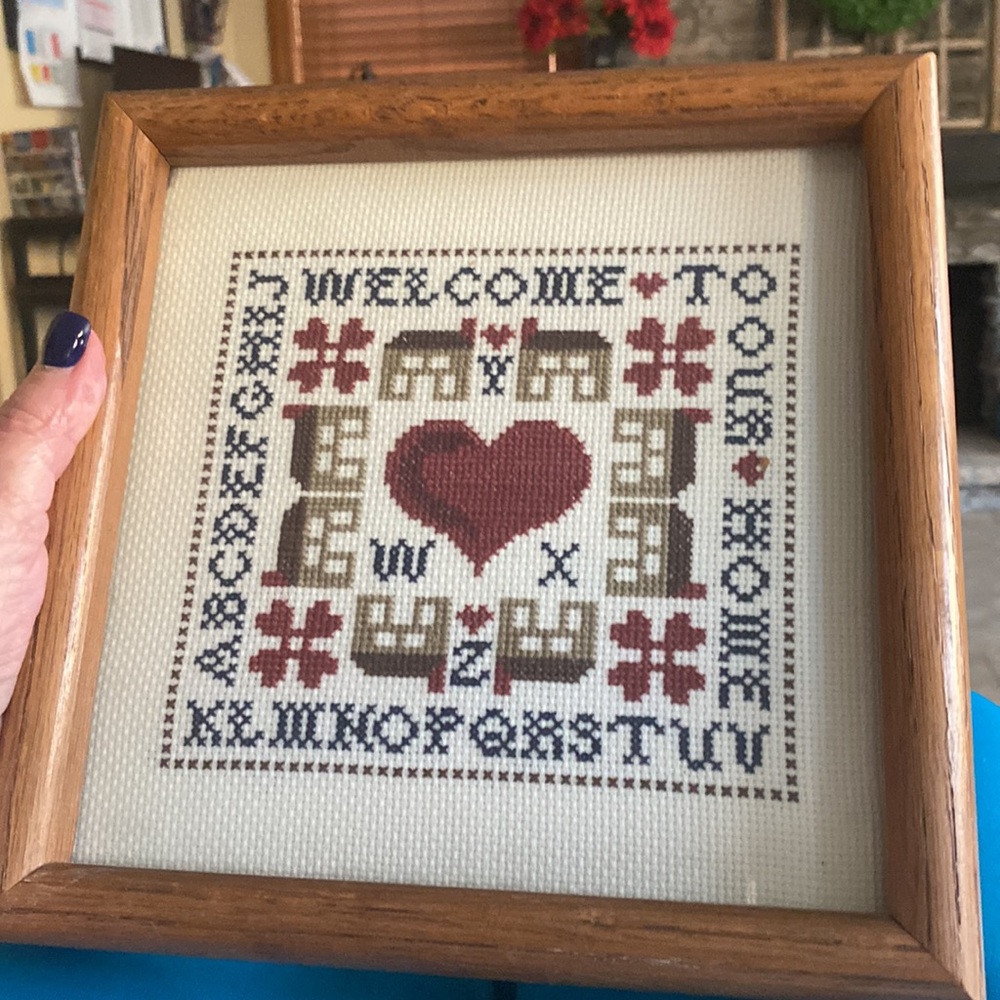 Handmade cross stitch Welcome To Our Home framed. Excellent used condition.